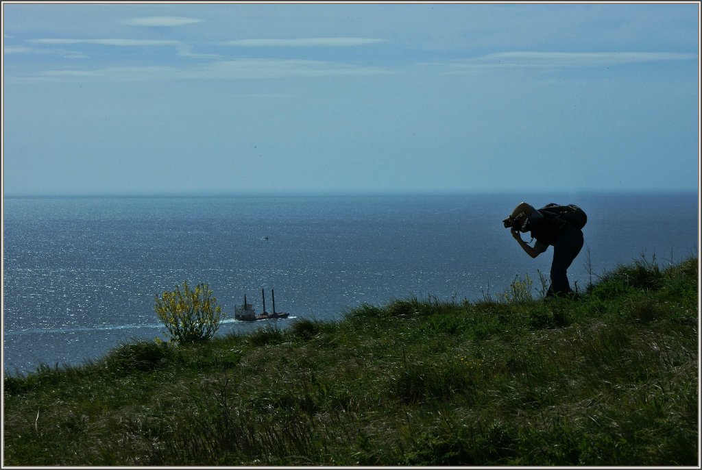Der Fotograf hat sein Motiv im Visier.
(16.05.2011)