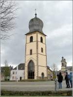Als Wahrzeichen von Mersch steht der  Alte Turm  aus dem Jahre 1709 mit dem Standbild des Drachent�ters St Michael, wie ein unbesiegter Ritter auf dem Michaelsplatz.